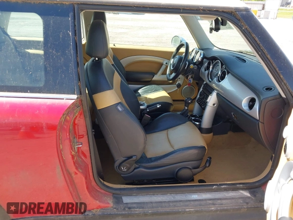 2006 MINI Hardtop S with VIN WMWRE33526TG99561, listed as a IAAI auction lot 42230639 with 202,113 mi miles and . Bid and sale history available at DreamBid. Image 5.