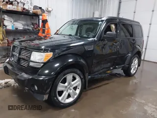 2011 Dodge Nitro Heat with VIN 1D4PU4GK1BW602572, listed as a IAAI auction lot 41529030 with 134,482 mi miles. Bid and sale history available at carsss.com. Image 18.