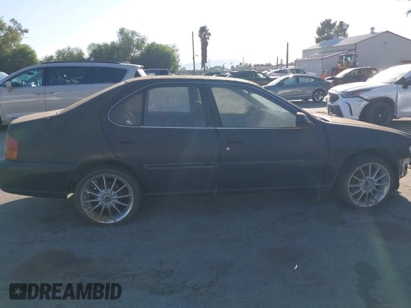 1998 Nissan Altima XE with VIN 1N4DL01D0WC237630, listed as a IAAI auction lot 41297277 with 101,965 mi miles. Bid and sale history available at carsss.com. Image 13.