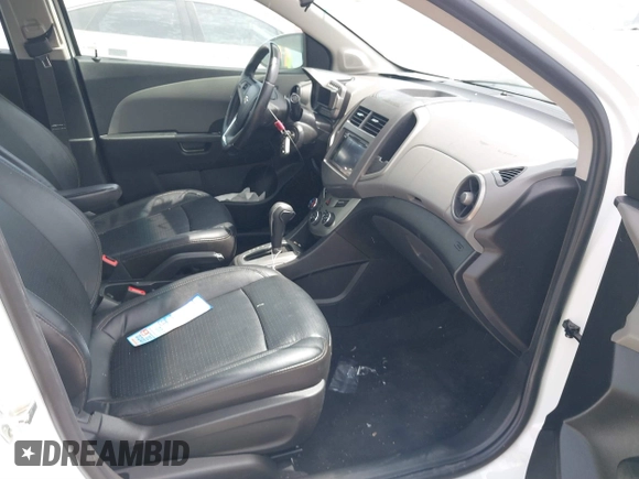 2014 Chevrolet Sonic LTZ with VIN 1G1JE5SB4E4227749, listed as a IAAI auction lot 38965556 with 69,550 mi miles. Bid and sale history available at carsss.com. Image 5.