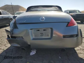 2004 Nissan 350Z Enthusiast z VIN JN1AZ36D34T110490, wystawiony jako Copart lot #57863915 z przebiegiem 139 757 mil mil oraz Szkody całkowita. Historia ofert i sprzedaży dostępna na DreamBid. Obrazek 6.