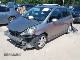 2007 Honda Fit Sport z VIN JHMGD38607S022249, wystawiony jako IAAI lot #42306807 z przebiegiem 101 422 mil mil oraz . Historia ofert i sprzedaży dostępna na DreamBid. Obrazek 2.