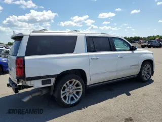 2019 Chevrolet Suburban Premier with VIN 1GNSKJKJ7KR339570, listed as a Copart auction lot 60350984 with 114,689 mi miles and Non Repairable. Bid and sale history available at DreamBid. Image 3.
