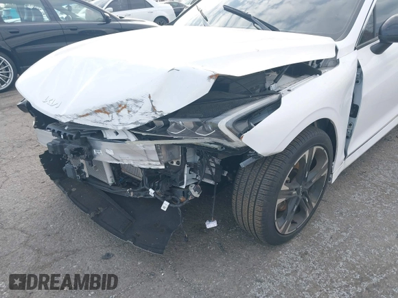2024 Kia K5 GT-Line z VIN 5XXG64J29RG259036, wystawiony jako IAAI lot #40777274 z przebiegiem 6716 mil mil oraz . Historia ofert i sprzedaży dostępna na DreamBid. Obrazek 6.