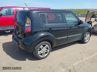 2011 Kia Soul + with VIN KNDJT2A27B7286270, listed as a IAAI auction lot 42063606 with 128,864 mi miles. Bid and sale history available at carsss.com. Image 4.