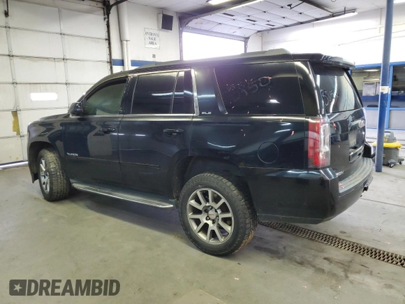 2015 GMC Yukon SLE with VIN 1GKS2AKC6FR229744, listed as a Copart auction lot 88270295 with 215,762 mi miles and Salvage Title. Bid and sale history available at DreamBid. Image 2.