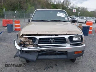 1996 Toyota Tacoma with VIN 4TAWM72N1TZ106162, listed as a IAAI auction lot 42056780 with 241,430 mi miles and . Bid and sale history available at DreamBid. Image 12.