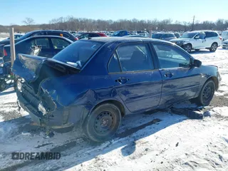 2003 Mitsubishi Lancer ES with VIN JA3AJ26E13U0A3996, listed as a IAAI auction lot 41251250 with 223,311 mi miles. Bid and sale history available at carsss.com. Image 4.