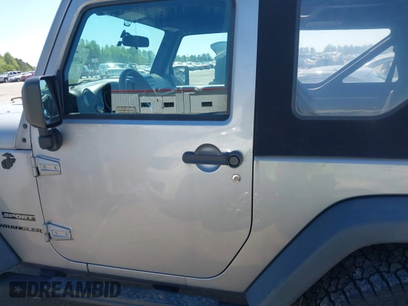 2015 Jeep Wrangler Sport with VIN 1C4AJWAG3FL696988, listed as a IAAI auction lot 41999036 with 79,064 mi miles. Bid and sale history available at carsss.com. Image 14.