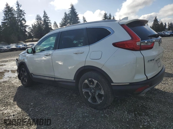 2018 Honda CR-V Touring with VIN 2HKRW2H90JH689742, listed as a Copart auction lot 51347445 with 35,333 mi miles and Salvage Title. Bid and sale history available at DreamBid. Image 2.