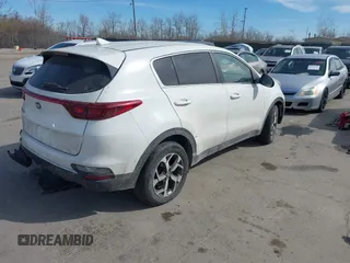 2020 Kia Sportage LX with VIN KNDPMCAC2L7776669, listed as a IAAI auction lot 41810620 with 186,599 mi miles and . Bid and sale history available at carsss.com. Image 4.