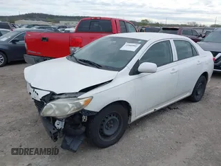 2010 Toyota Corolla with VIN 1NXBU4EE3AZ366288, listed as a IAAI auction lot 41880883 with 207,127 mi miles. Bid and sale history available at carsss.com. Image 2.