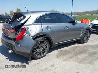 2015 Infiniti QX70 with VIN JN8CS1MW1FM481233, listed as a IAAI auction lot 41976458 with 134,875 mi miles and . Bid and sale history available at DreamBid. Image 4.