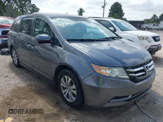 2014 Honda Odyssey EX-L with VIN 5FNRL5H69EB075115, listed as a IAAI auction lot 42046386 with 200,340 mi miles and . Bid and sale history available at carsss.com. Image 1.