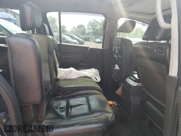 2007 Infiniti QX56 z VIN 5N3AA08C87N806622, wystawiony jako Copart lot #57411845 z przebiegiem 218 557 mil mil oraz Czysty tytuł • Clean title. Historia ofert i sprzedaży dostępna na DreamBid. Obrazek 11.