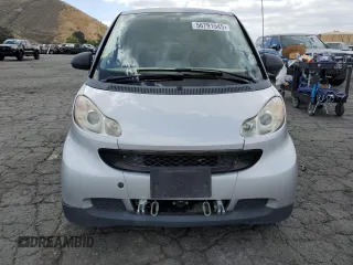 2009 Smart fortwo Pure with VIN WMEEJ31X89K251402, listed as a Copart auction lot 56791545 with 52,636 mi miles and Clean title. Bid and sale history available at DreamBid. Image 5.