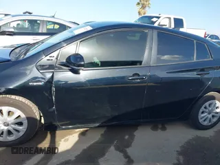 2020 Toyota Prius L Eco z VIN JTDKARFU6L3104385, wystawiony jako IAAI lot #41922029 z przebiegiem 123 235 mil mil oraz . Historia ofert i sprzedaży dostępna na DreamBid. Obrazek 14.