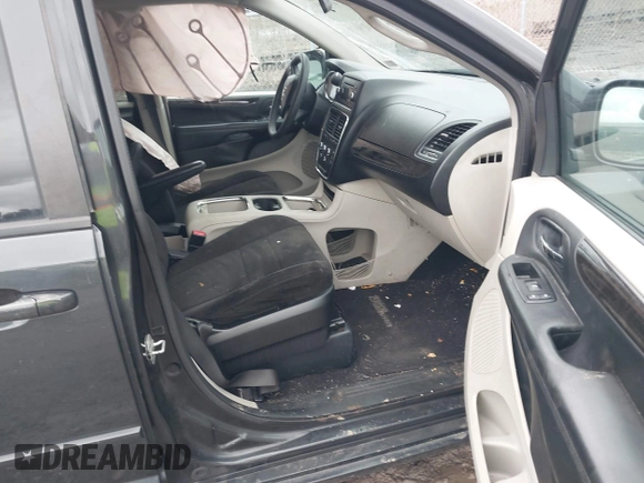 2012 Dodge Grand Caravan SXT with VIN 2C4RDGCG8CR242235, listed as a IAAI auction lot 41922083 with 124,306 mi miles and . Bid and sale history available at DreamBid. Image 5.