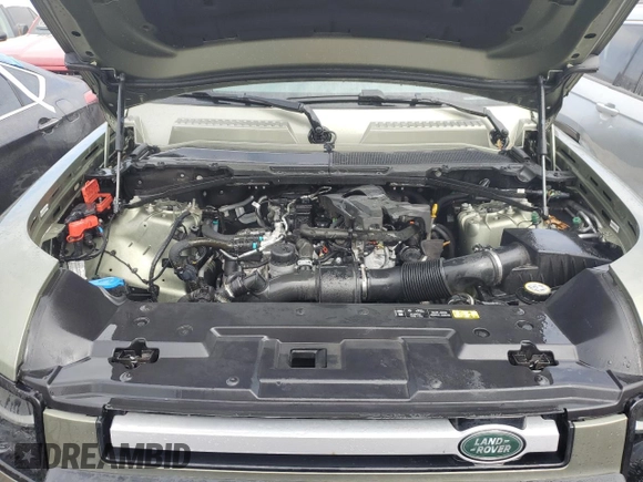 2023 Land Rover Defender S with VIN SALEJ6EX1P2114172, listed as a Copart auction lot 75063664 with Not provided miles and Salvage title. Bid and sale history available at DreamBid. Image 12.