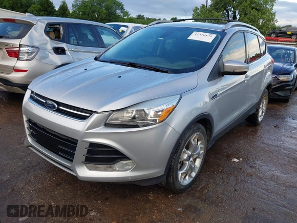 2013 Ford Escape Titanium with VIN 1FMCU0J90DUC13877, listed as a IAAI auction lot 42370172 with 119,745 mi miles and . Bid and sale history available at DreamBid. Image 2.