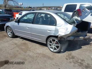 2002 Honda Civic LX with VIN 1HGES15562L039463, listed as a IAAI auction lot 41851232 with 173,411 mi miles. Bid and sale history available at carsss.com. Image 3.