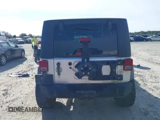 2007 Jeep Wrangler Unlimited X with VIN 1J4GB39147L199367, listed as a IAAI auction lot 40897772 with 229,309 mi miles and . Bid and sale history available at DreamBid. Image 16.
