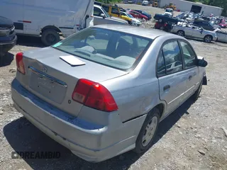 2001 Honda Civic LX z VIN 2HGES165X1H534419, wystawiony jako IAAI lot #42328959 z przebiegiem 206 937 mil mil oraz . Historia ofert i sprzedaży dostępna na DreamBid. Obrazek 4.