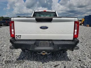 2023 Ford F-250 XL с VIN 1FT7X2BA4PEC40595, выставлен на аукционе Copart как лот 64612205 с пробегом 79 599 миль миль и Списание • Salvage title. История ставок и продаж доступна на DreamBid. Изображение 6.