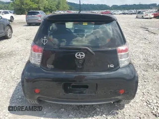 2014 Scion iQ with VIN JTNJJXB07EJ028558, listed as a Copart auction lot 64745345 with 112,221 mi miles and Clean title. Bid and sale history available at DreamBid. Image 6.