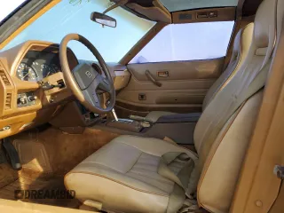 1980 Datsun 280ZX z VIN HS130221335, wystawiony jako Copart lot #76338304 z przebiegiem 135 266 mil mil oraz Szkody całkowita. Historia ofert i sprzedaży dostępna na DreamBid. Obrazek 7.
