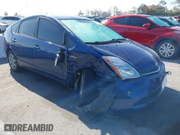 2009 Toyota Prius with VIN JTDKB20U297856633, listed as a IAAI auction lot 42013442 with 247,448 mi miles. Bid and sale history available at carsss.com. Image 1.