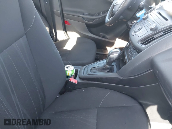 2016 Ford Focus SE with VIN 1FADP3F23GL252346, listed as a IAAI auction lot 42247184 with 99,025 mi miles and . Bid and sale history available at DreamBid. Image 5.