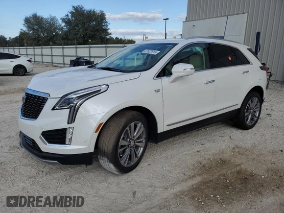 2024 Cadillac XT5 FWD Premium Luxury with VIN 1GYKNCRSXRZ745180, listed as a Copart auction lot 87627615 with 6,753 mi miles and Salvage Title. Bid and sale history available at carsss.com. Image 1.
