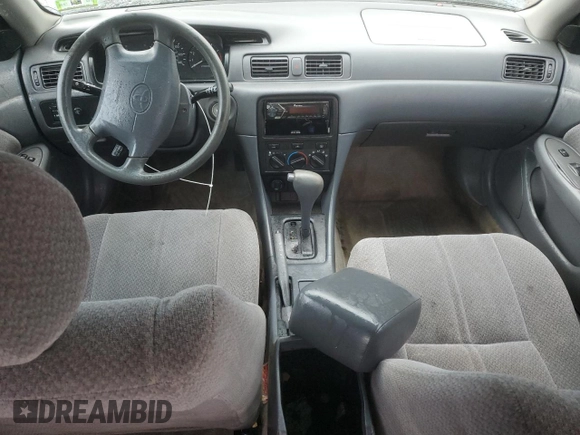 2001 Toyota Camry CE z VIN JT2BG22K710561238, wystawiony jako Copart lot #56686255 z przebiegiem Nie podano mil oraz Szkoda całkowita • Salvage title. Historia ofert i sprzedaży dostępna na DreamBid. Obrazek 8.