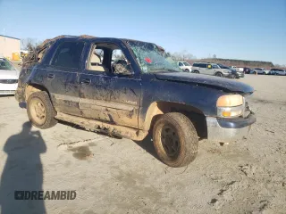 2002 GMC Yukon SLT with VIN 1GKEK13Z62J148557, listed as a Copart auction lot 43246075 with 242,968 mi miles and Salvage Title. Bid and sale history available at carsss.com. Image 4.