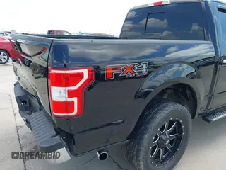 2019 Ford F-150 XL with VIN 1FTEW1E59KKE90346, listed as a IAAI auction lot 42188308 with 130,992 mi miles and . Bid and sale history available at DreamBid. Image 19.