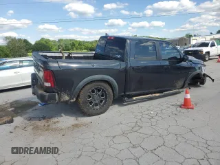 2017 Ram 1500 Rebel z VIN 1C6RR7YT3HS553611, wystawiony jako Copart lot #56063905 z przebiegiem 136 239 mil mil oraz Szkoda całkowita • Salvage title. Historia ofert i sprzedaży dostępna na DreamBid. Obrazek 3.