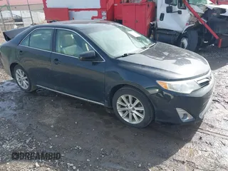 2014 Toyota Camry SE with VIN 4T1BK1FK3EU537670, listed as a IAAI auction lot 41649097 with 64,636 mi miles. Bid and sale history available at carsss.com. Image 1.