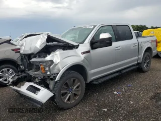 2018 Ford F-150 XL with VIN 1FTEW1E55JFE60025, listed as a Copart auction lot 60631515 with 124,333 mi miles and Salvage title. Bid and sale history available at DreamBid. Image 1.