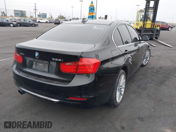 2014 BMW 3 Series 328i xDrive with VIN WBA3B5C51EP543364, listed as a IAAI auction lot 42138365 with 145,243 mi miles and . Bid and sale history available at DreamBid. Image 4.