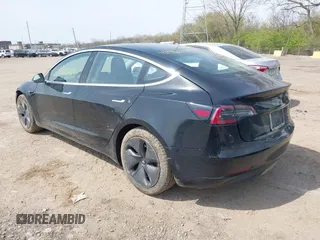 2018 Tesla Model 3 Long Range Battery z VIN 5YJ3E1EB2JF103096, wystawiony jako IAAI lot #42016324 z przebiegiem 143 247 mil mil oraz . Historia ofert i sprzedaży dostępna na DreamBid. Obrazek 3.