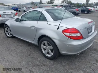 2006 Mercedes-Benz SLK-Class 3.0L with VIN WDBWK54F26F130107, listed as a IAAI auction lot 42067876 with 167,518 mi miles. Bid and sale history available at carsss.com. Image 3.