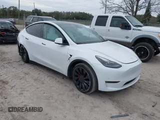 2022 Tesla Model Y Performance z VIN 7SAYGDEF0NF468566, wystawiony jako IAAI lot #41271452 z przebiegiem Nie podano mil oraz . Historia ofert i sprzedaży dostępna na DreamBid. Obrazek 1.
