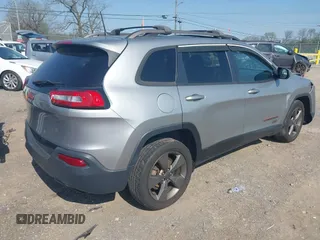 2016 Jeep Cherokee 75th Anniversary with VIN 1C4PJLCB5GW287420, listed as a IAAI auction lot 41984043 with 145,577 mi miles. Bid and sale history available at carsss.com. Image 4.