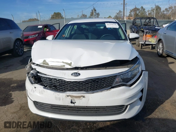 2016 Kia Optima LX Turbo with VIN 5XXGT4L15GG022697, listed as a IAAI auction lot 41410728 with 72,628 mi miles. Bid and sale history available at carsss.com. Image 12.