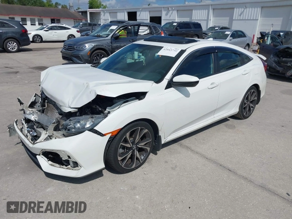 2018 Honda Civic Si with VIN 2HGFC1E53JH700251, listed as a IAAI auction lot 42043732 with 104,763 mi miles and . Bid and sale history available at DreamBid. Image 17.