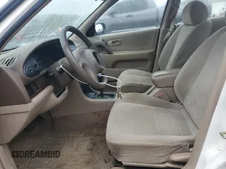 1997 Nissan Altima XE with VIN 1N4BU31D4VC232757, listed as a Copart auction lot 79102784 with 211,466 mi miles and Salvage Title. Bid and sale history available at carsss.com. Image 7.