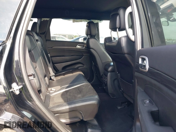 2021 Jeep Grand Cherokee Laredo E with VIN 1C4RJEAG0MC571375, listed as a IAAI auction lot 42087648 with 29,358 mi miles and . Bid and sale history available at DreamBid. Image 8.