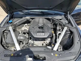 2023 Genesis G70 2.0T z VIN KMTG34TA4PU121426, wystawiony jako Copart lot #52968245 z przebiegiem 27 888 mil mil oraz Tytuł czysty. Historia ofert i sprzedaży dostępna na DreamBid. Obrazek 11.
