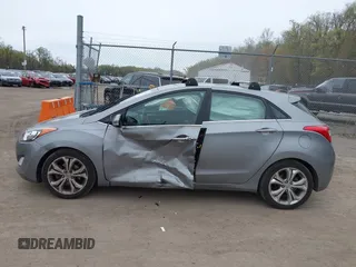 2014 Hyundai Elantra GT with VIN KMHD35LH6EU165019, listed as a IAAI auction lot 42016057 with 121,794 mi miles. Bid and sale history available at carsss.com. Image 14.
